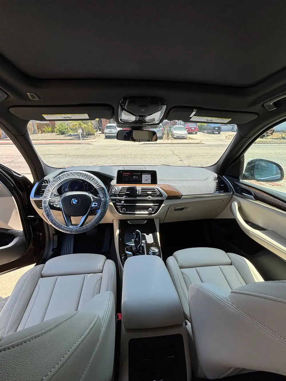 Clean grey leather BMW cabin after an interior detail